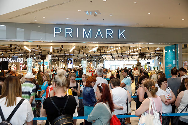 Crowds of customers waiting outside the new Primark store, Credit: Tina Ramujkić