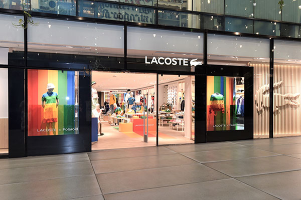 Lacoste has center court - ACROSS