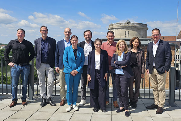 People from left to right: Mr. Eder (IFG), Mr. Siegfried (AIP), behind them Mr. Klein (IPH), Mr. Kammerbauer (BBE), Mr. Wotruba (BBE), Ms. Harst (City of Ingolstadt), Prof. Dr. Rosenfeld (Economic Advisor to the City of Ingolstadt and Chairman of IFG), Ms. Daffner (IFG), Ms. Scholze (AIP), Ms. Wittmann-Brand (City Planning Officer for the City of Ingolstadt). /// credit: BBE Handelsberatung